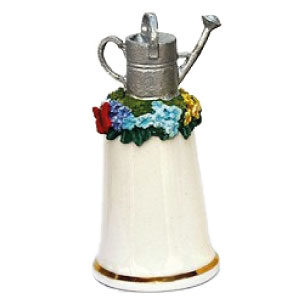 Porcelain thimbles with pewter subjects